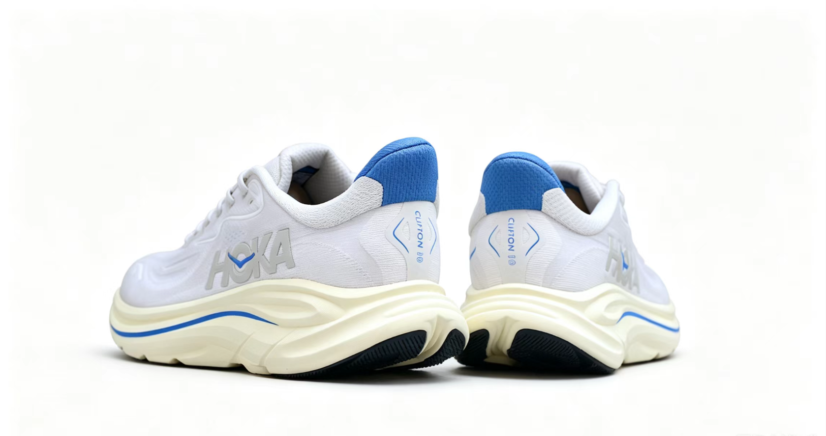 HOKA ONE ONE Clifton 10 – White Running Shoes with Blue Heel and Midsole Accent